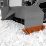 MoDUS® modular cast steel carbide snow pusher plow shoe system on Pro-Tech plow